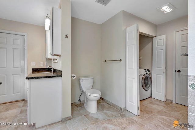 2701 Kempton Hills Dr, Anchorage, AK 99516 - bathroom featuring washer / dryer and vanity