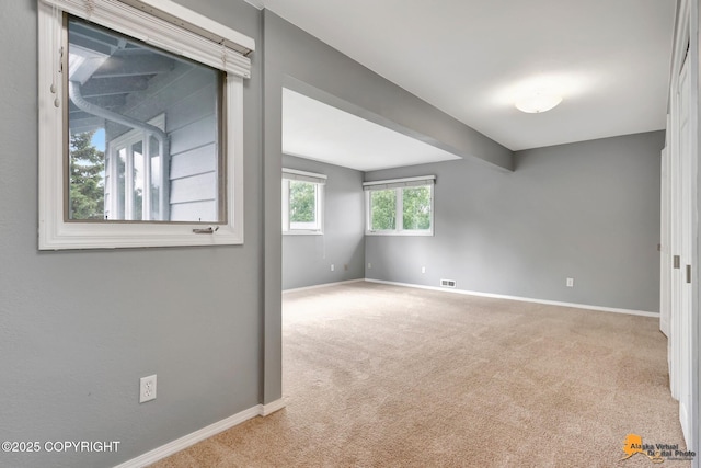 2701 Kempton Hills Dr, Anchorage, AK 99516 - unfurnished room featuring baseboards and carpet floors