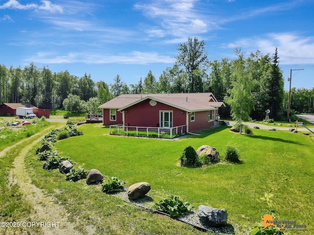 23324 Greatland Dr, Chugiak, AK 99577 - view of home's exterior with a yard and a deck