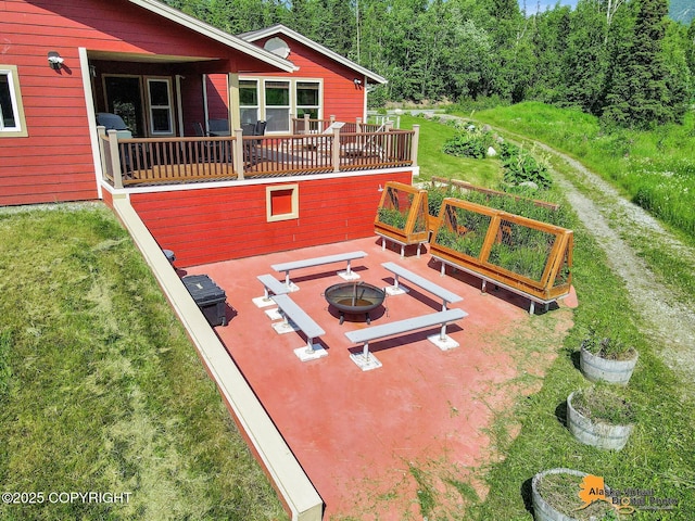 23324 Greatland Dr, Chugiak, AK 99577 - exterior space with a fire pit and a patio