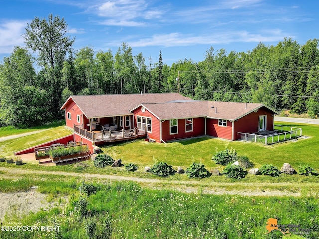 23324 Greatland Dr, Chugiak, AK 99577 - view of subject property with a heavily wooded area