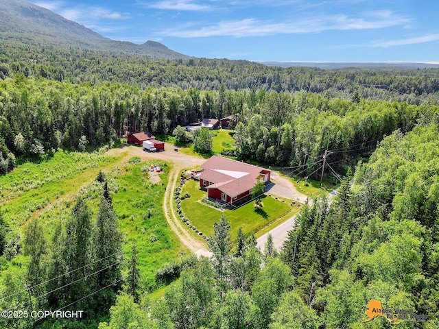 23324 Greatland Dr, Chugiak, AK 99577 - view from above of property featuring a forest and a mountainous background