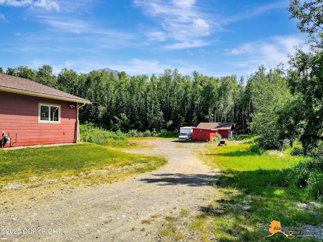 23324 Greatland Dr, Chugiak, AK 99577 - view of street with a view of trees