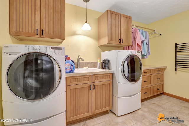23324 Greatland Dr, Chugiak, AK 99577 - laundry room featuring cabinet space and washing machine and dryer