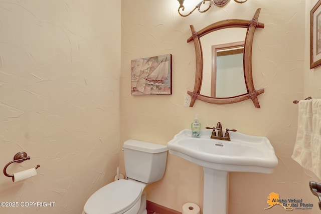 23324 Greatland Dr, Chugiak, AK 99577 - half bath with toilet and a sink