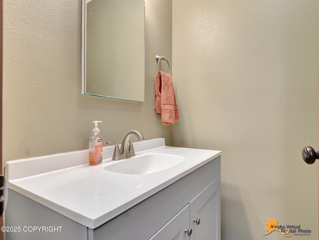 23324 Greatland Dr, Chugiak, AK 99577 - bathroom with vanity and a textured wall