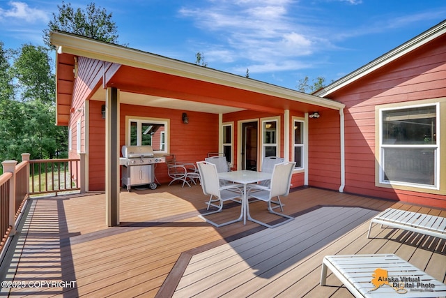 23324 Greatland Dr, Chugiak, AK 99577 - wooden terrace featuring outdoor dining area and a grill
