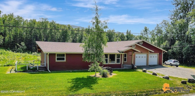 23324 Greatland Dr, Chugiak, AK 99577 - single story home featuring an attached garage, driveway, and a front lawn