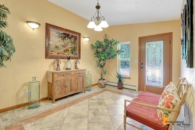 23324 Greatland Dr, Chugiak, AK 99577 - entrance foyer featuring a baseboard heating unit, a chandelier, and inlaid floor details