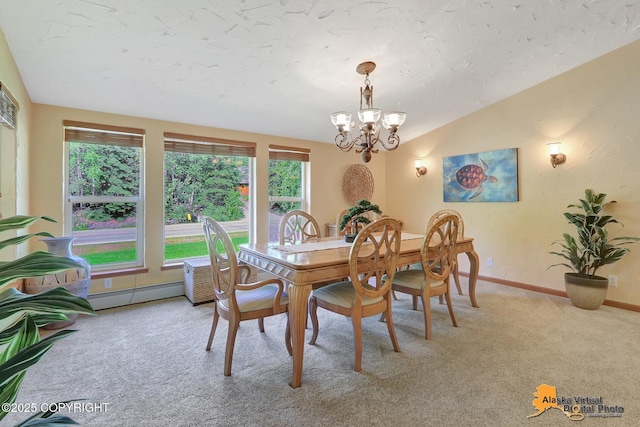 23324 Greatland Dr, Chugiak, AK 99577 - dining area with light carpet, a baseboard radiator, a chandelier, and lofted ceiling