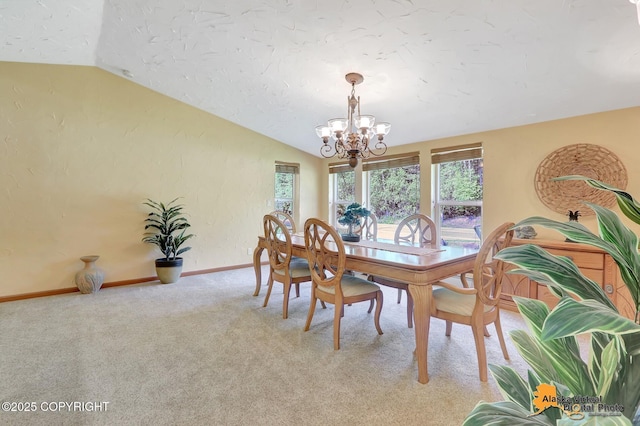 23324 Greatland Dr, Chugiak, AK 99577 - dining area with a chandelier, vaulted ceiling, healthy amount of natural light, and light carpet