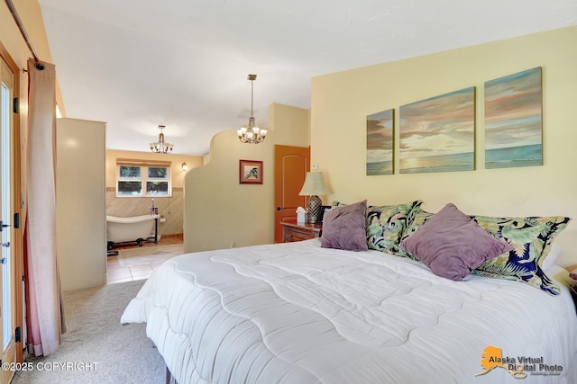 23324 Greatland Dr, Chugiak, AK 99577 - bedroom featuring a chandelier and light carpet