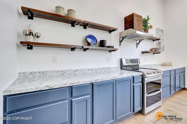 3528 S Mills Ct, Big Lake, AK 99623 - kitchen with open shelves, double oven range, blue cabinets, and extractor fan