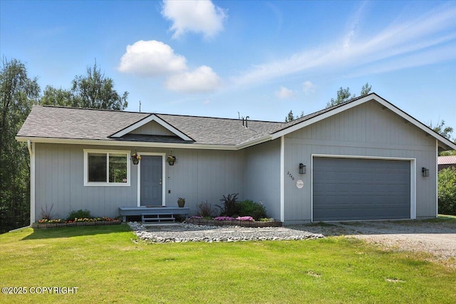2740 S Rue De La Paix Loop, Wasilla, AK 99623 - ranch-style home with driveway, a garage, a front lawn, and a shingled roof