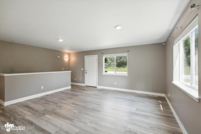 2740 S Rue De La Paix Loop, Wasilla, AK 99623 - empty room featuring wood finished floors and recessed lighting