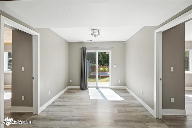 2740 S Rue De La Paix Loop, Wasilla, AK 99623 - unfurnished room with wood finished floors and baseboards