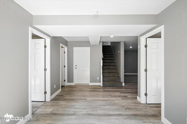 2740 S Rue De La Paix Loop, Wasilla, AK 99623 - spare room featuring stairs and wood finished floors