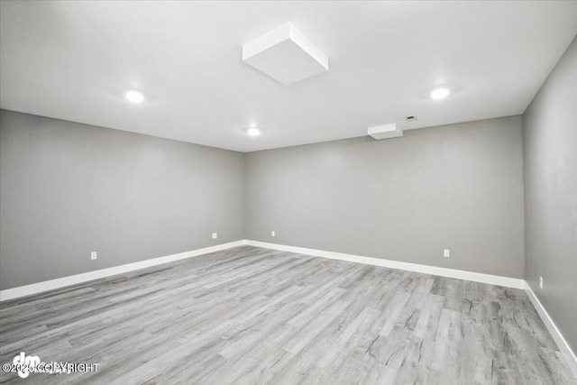 2740 S Rue De La Paix Loop, Wasilla, AK 99623 - unfurnished room featuring wood finished floors and recessed lighting