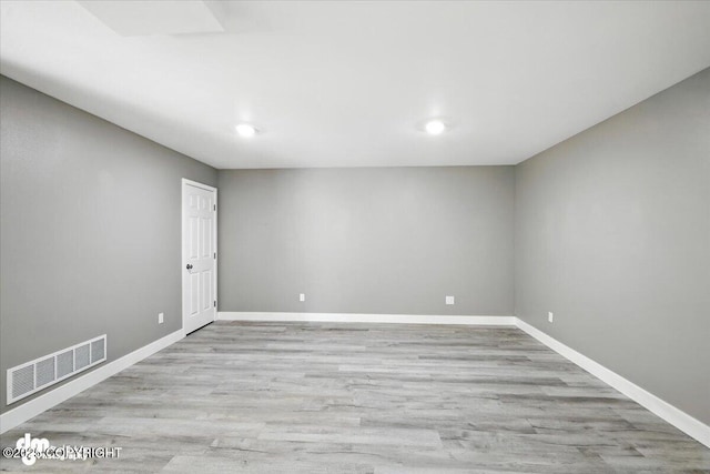 2740 S Rue De La Paix Loop, Wasilla, AK 99623 - unfurnished room featuring wood finished floors and recessed lighting