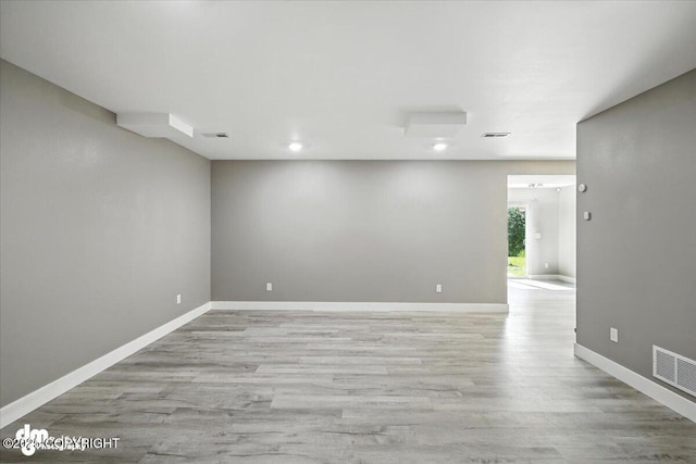 2740 S Rue De La Paix Loop, Wasilla, AK 99623 - spare room featuring wood finished floors and recessed lighting
