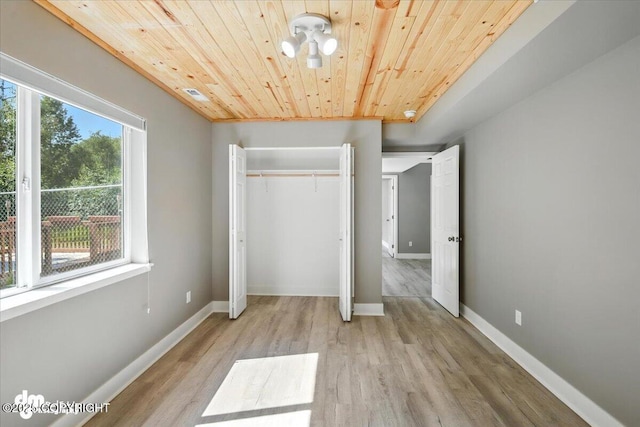 2740 S Rue De La Paix Loop, Wasilla, AK 99623 - unfurnished bedroom with wood ceiling, wood finished floors, and a closet