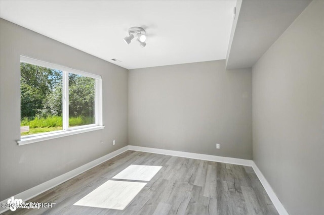 2740 S Rue De La Paix Loop, Wasilla, AK 99623 - unfurnished room with wood finished floors and baseboards