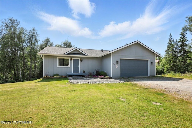 2740 S Rue De La Paix Loop, Wasilla, AK 99623 - single story home featuring gravel driveway, an attached garage, and a front lawn