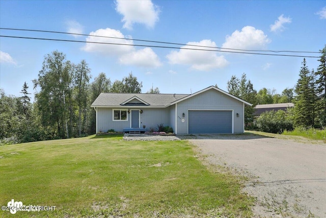 2740 S Rue De La Paix Loop, Wasilla, AK 99623 - ranch-style home featuring a garage, dirt driveway, and a front yard