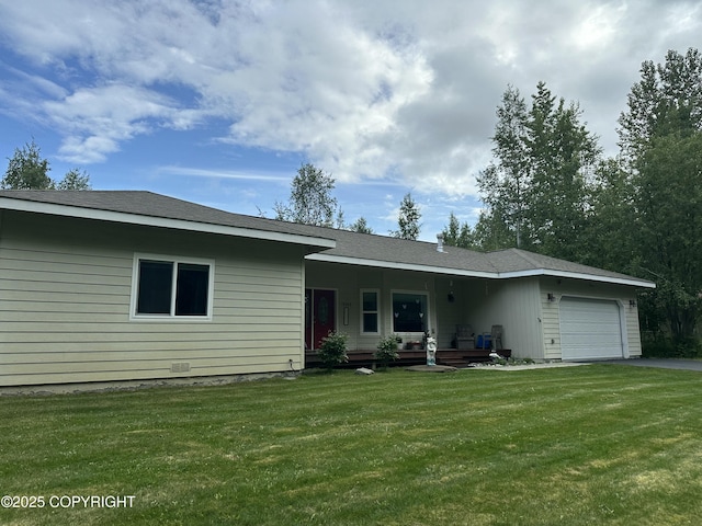 19343 Alma Ave, Chugiak, AK 99567 - view of front of property featuring a garage, driveway, a front lawn, and covered porch