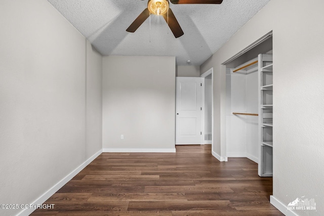 645 W Sarahs Way, Wasilla, AK 99654 - unfurnished bedroom with wood finished floors, a textured ceiling, and ceiling fan