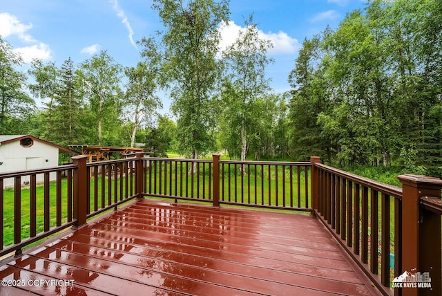 645 W Sarahs Way, Wasilla, AK 99654 - deck featuring a yard and view of wooded area