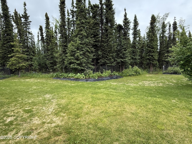 39740 Billikin St, Sterling, AK 99672 - view of grassy yard with a wooded view