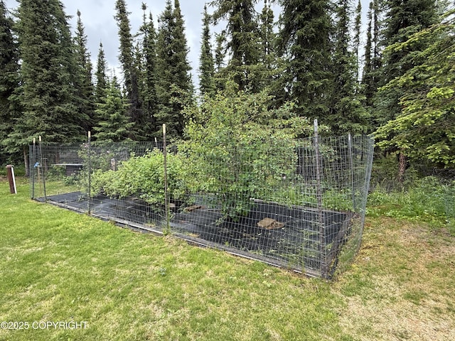 39740 Billikin St, Sterling, AK 99672 - view of green lawn with a garden