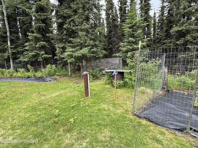 39740 Billikin St, Sterling, AK 99672 - view of green lawn with a garden