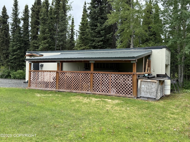 39740 Billikin St, Sterling, AK 99672 - back of property with a yard and a metal roof