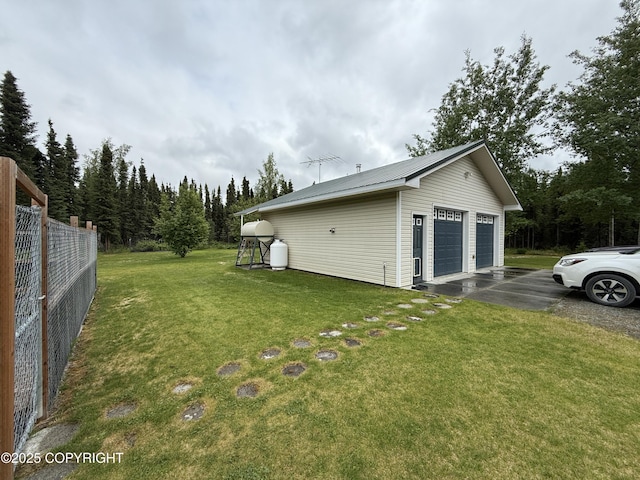 39740 Billikin St, Sterling, AK 99672 - view of yard with a detached garage and an outbuilding