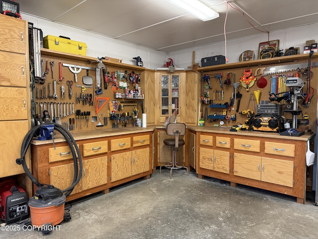 39740 Billikin St, Sterling, AK 99672 - miscellaneous room featuring a workshop area and concrete floors