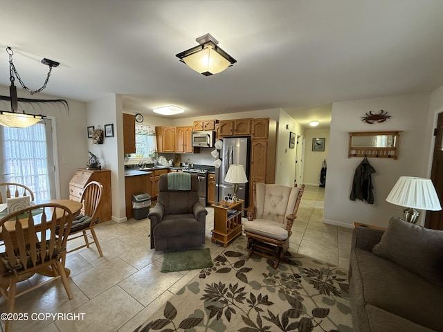 39740 Billikin St, Sterling, AK 99672 - living area with light tile patterned floors and baseboards