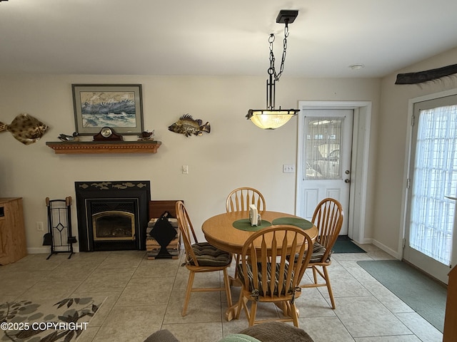 39740 Billikin St, Sterling, AK 99672 - dining area featuring light tile patterned flooring and a fireplace