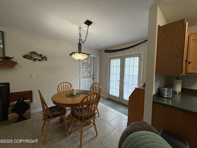 39740 Billikin St, Sterling, AK 99672 - dining room featuring light tile patterned flooring and baseboards