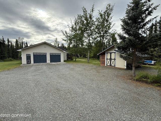 39740 Billikin St, Sterling, AK 99672 - garage featuring a storage unit