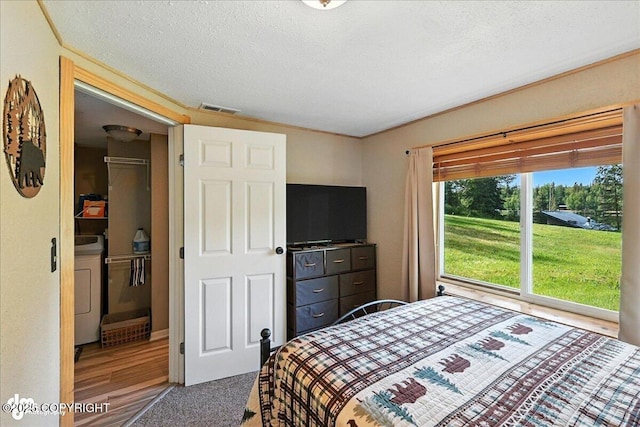 48416 Bernice Lake Rd, Nikiski/North Kenai, AK 99611 - bedroom featuring a textured ceiling