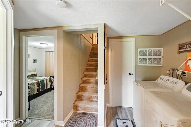 48416 Bernice Lake Rd, Nikiski/North Kenai, AK 99611 - laundry room with washer and dryer and wood finished floors