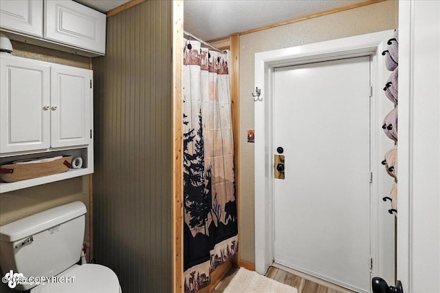 48416 Bernice Lake Rd, Nikiski/North Kenai, AK 99611 - bathroom featuring wood finished floors and a shower with shower curtain