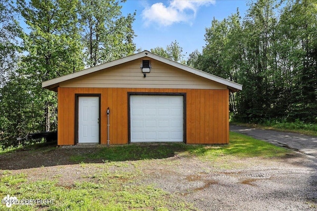 48416 Bernice Lake Rd, Nikiski/North Kenai, AK 99611 - garage featuring driveway
