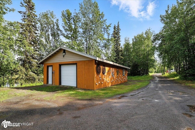 48416 Bernice Lake Rd, Nikiski/North Kenai, AK 99611 - detached garage featuring driveway