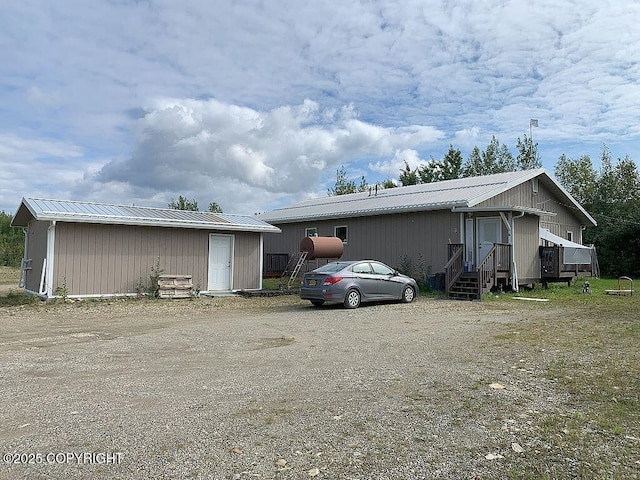 2004 N Old Steese Hwy, Fairbanks, AK 99712 - view of front of home featuring a metal roof and an outbuilding