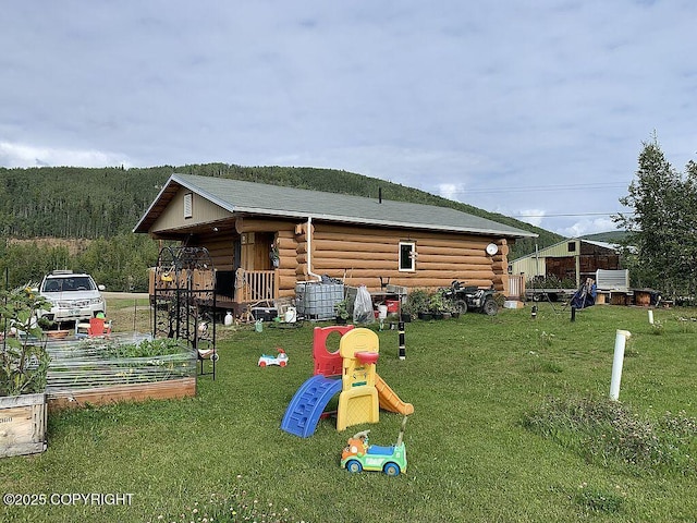 2004 N Old Steese Hwy, Fairbanks, AK 99712 - view of play area with a lawn