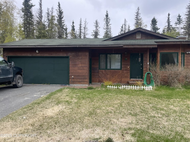 514 Ash Ave, Kenai, AK 99611 - view of front of property featuring an attached garage, driveway, and a front lawn