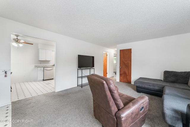8764 Trinity Dr, Juneau, AK 99801 - living room with ceiling fan, light colored carpet, and a textured ceiling